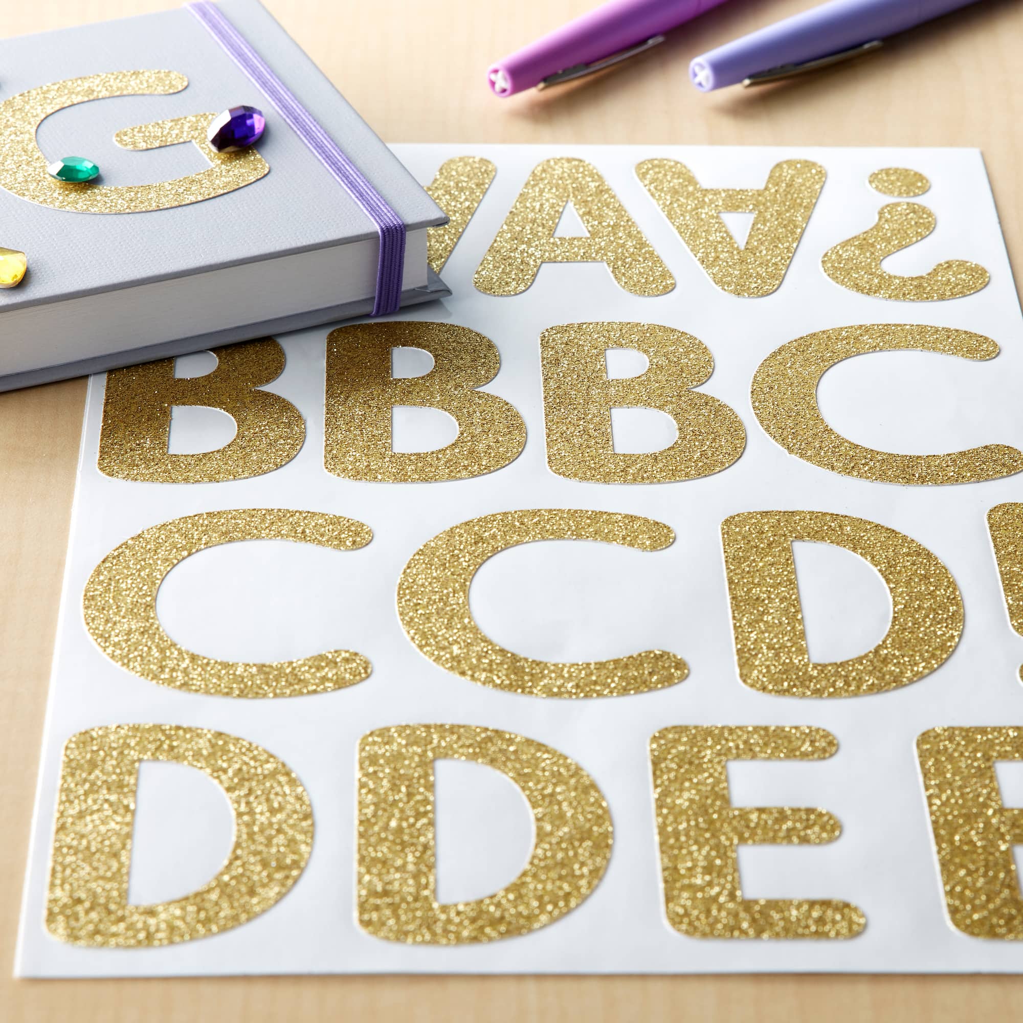 12 Pack: Gold Glitter Rounded Font Alphabet Stickers by Recollections™